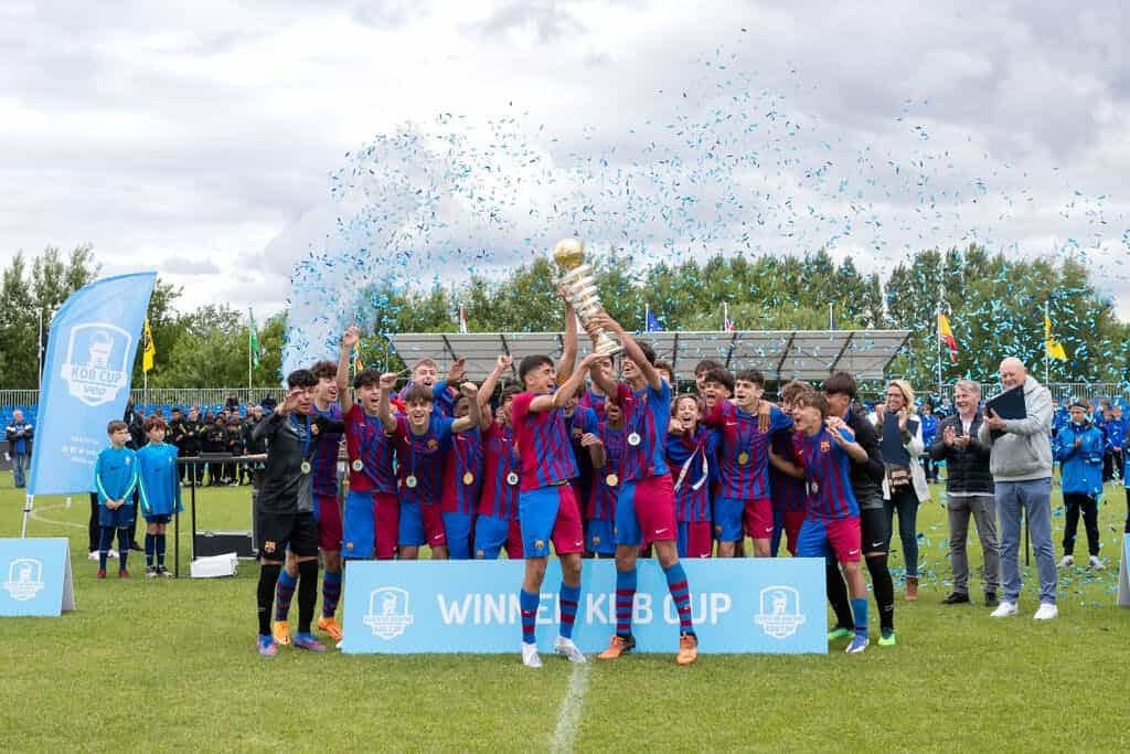 FC Barcelona - Champions of the KDB Cup, Celebrating Their Victory with the Prestigious Trophy in Hand
